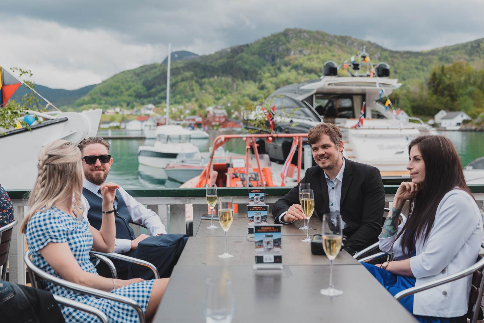 Company outing toasting by the guest harbour